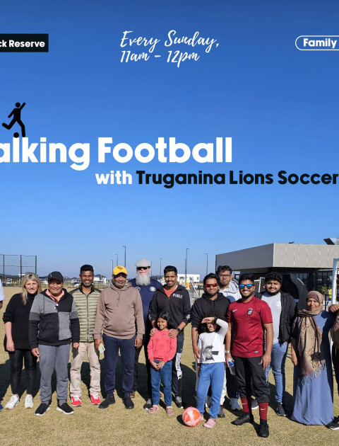 A group of people are smiling at the camera