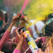 Holi celebration! By Vedika. Hand holding a colour gun