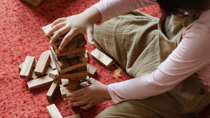 Girl playing with blocks 