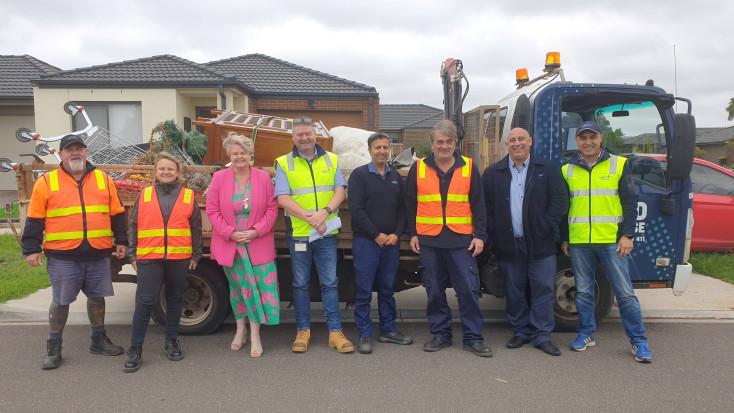 council staff collecting rubbish
