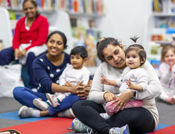 Parents and children enjoying rhyme time