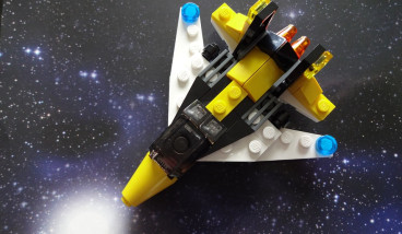 A little spaceship built out of Lego.